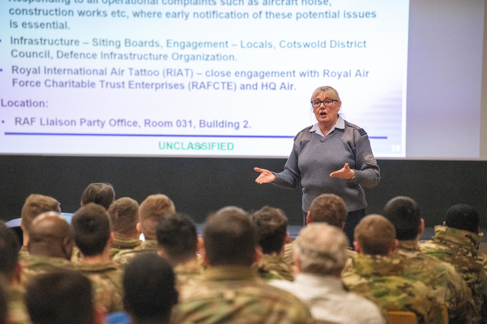 A leader speaks during a briefing