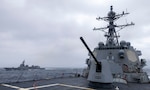 he Arleigh Burke-class guided-missile destroyer USS Dewey (DDG 105) sails alongside the Japan Maritime Self-Defense Force Asahi-class destroyer JS Asahi (DD-119) during bilateral operations in the Philippine Sea, Feb. 10, 2025.