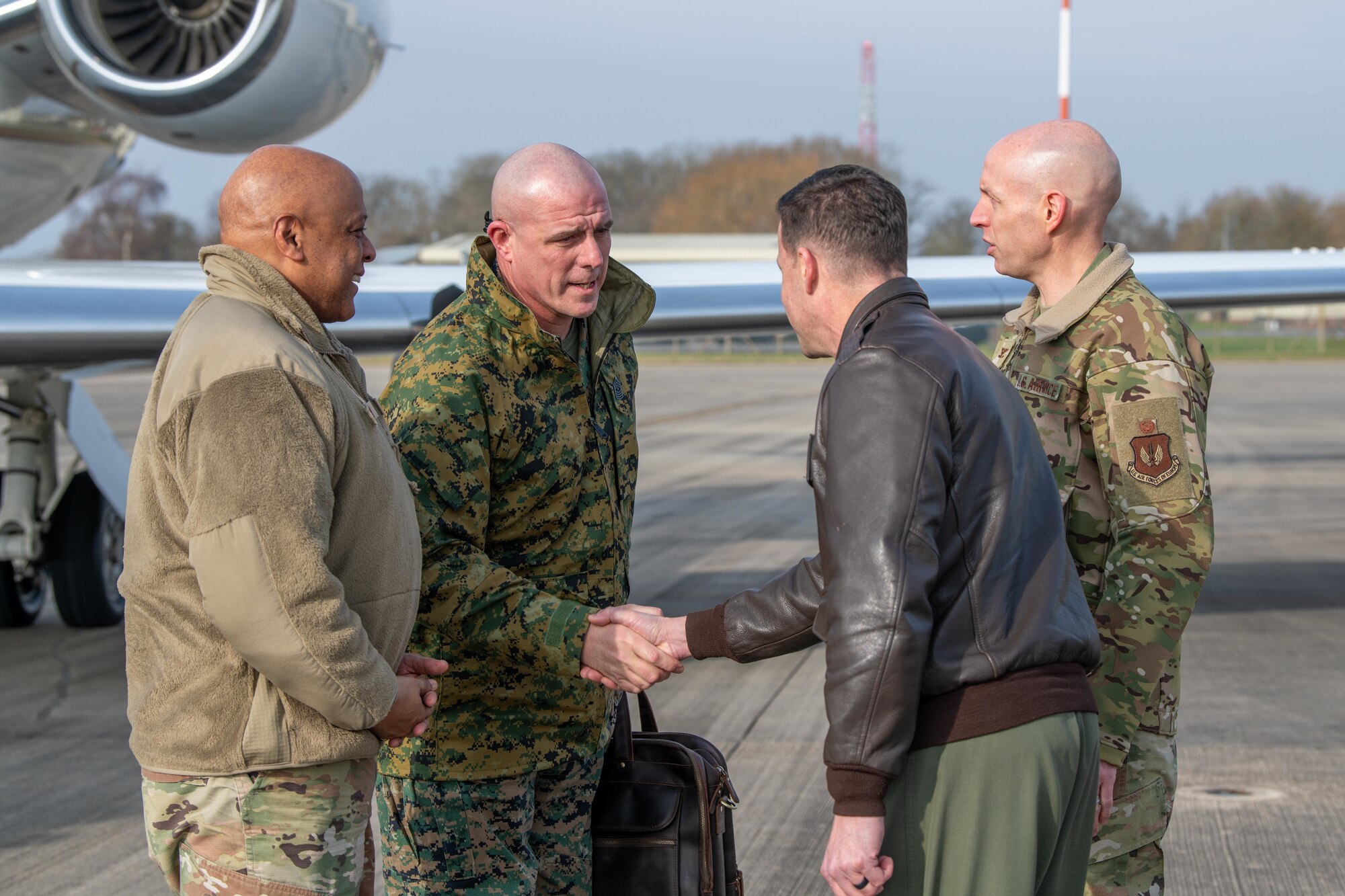 Leaders shake hands with each other