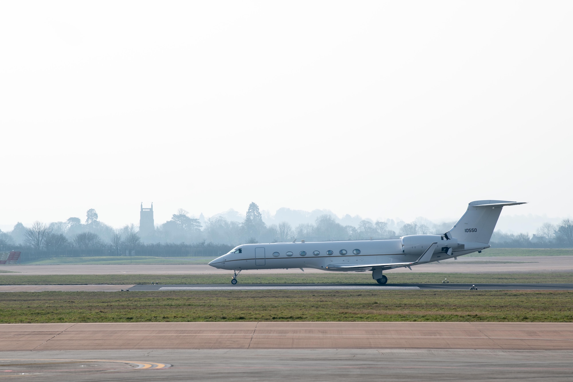 A Gulfstream C-37A taxis on a runway
