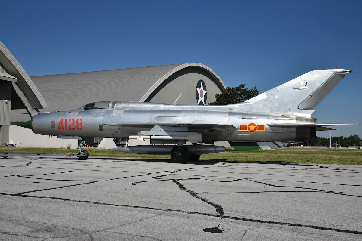 aircraft in front of hangar
