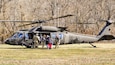 Airmen from the Kentucky Air National Guard’s 123rd Special Tactics Squadron evacuate 296 stranded residents from two housing complexes surrounded by floodwaters in Martin County, Kentucky, Feb. 17, 2025. The residents were flown to the Big Sandy Regional Airport in Debord, Kentucky, aboard UH-60 Black Hawk helicopters from the Indiana Army National Guard and the Kentucky Army National Guard’s 63rd Theater Aviation Brigade. (U.S. Air National Guard photo by Tech. Sgt. Robert Walker)