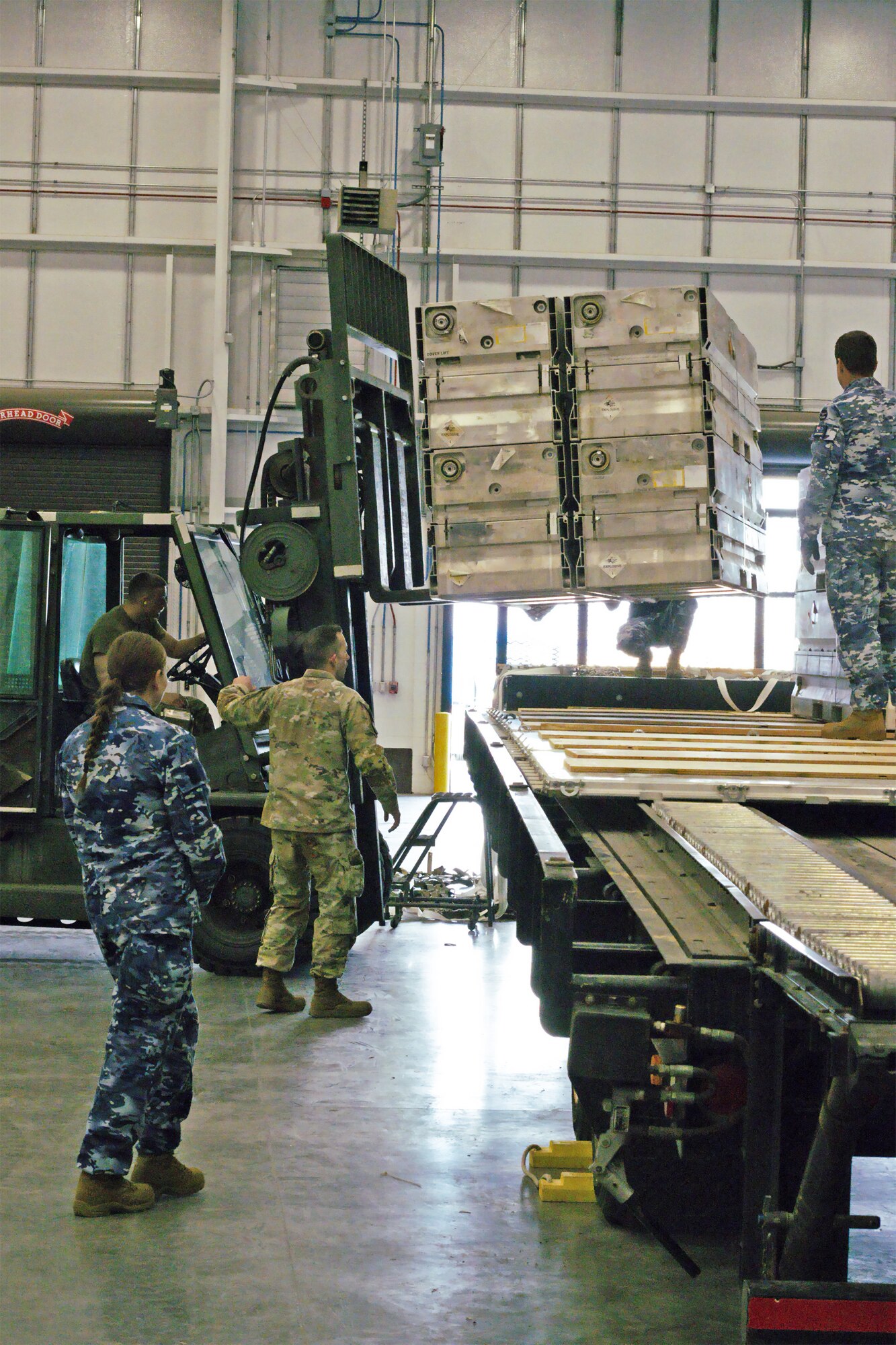 The 75th Mission Support Group hosted the Royal Australian Air Force in a combined 649th Munitions Squadron and 75th Logistics Readiness Squadron mission in this past week. The squadrons assisted the RAAF Mobile Air Load Team in palletizing and preparing Australian munitions for transport.  (U.S. Air Force Photo by Staff Sgt Mohammad Ebrahimi)