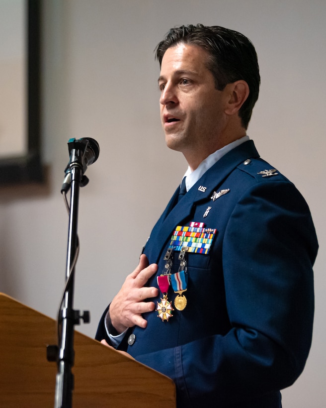 Col. Hans Otto, outgoing commander of the 123rd Medical Group commander, addresses audience members during his retirement ceremony at the Kentucky Air National Guard Base in Louisville, Ky., Dec. 15, 2024.