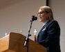 Col. Patricia Adams addresses the audience after assuming command of the 123rd Medical Group during a ceremony at the Kentucky Air National Guard Base in Louisville, Ky., Dec. 15, 2024.