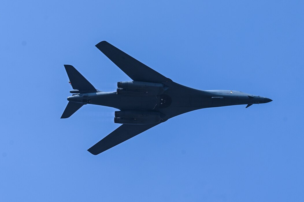 A U.S. Air Force B-1B Lancer assigned to the 34th Expeditionary Bomb Squadron, Ellsworth Air Force Base, S.D., tilts sideways while conducting a fly over at Aero India air show at Yelahanka Air Force Station, Bengaluru, India, Feb. 13, 2025.