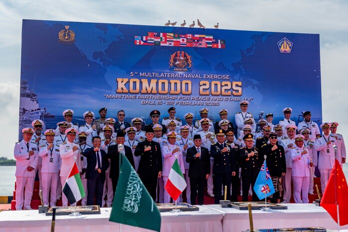 BALI, Indonesia (Feb. 16, 2025) - Representatives of 38 nations pose together for a group photo during the opening ceremony of Multilateral Naval Exercise Komodo (MNEK) 2025 in Bali, Indonesia, Feb. 16. Hosted by the Indonesian Navy, MNEK 2025 is an international, joint exercise taking place in the vicinity of Bali, Indonesia, emphasizing multilateral maritime cooperation and disaster response. (U.S. Navy photo by Mass Communication Specialist 1st Class Caroline H. Lui)