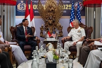 Adm. Steve Koehler, commander, U.S. Pacific Fleet, right, speaks with Sjafrie Sjamsoeddin, Indonesia’s minister of defense, during the 6th International Maritime Security Symposium (IMSS), held in conjunction with Multilateral Naval Exercise Komodo (MNEK) 2025, in Bali, Indonesia, Feb. 17.
