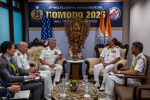 BALI, Indonesia (Feb. 17, 2025) - Adm. Steve Koehler, commander, U.S. Pacific Fleet, center left, speaks with Vice Adm. Vineet McCarty, Indian Navy controller personnel services, center right, during the 6th International Maritime Security Symposium (IMSS), held in conjunction with Multilateral Naval Exercise Komodo (MNEK) 2025 in Bali, Indonesia, Feb. 17. The IMSS is the largest international symposium event organized by the Indonesian Navy that brings naval leaders from around the world to discuss the latest maritime issues. (U.S. Navy photo by Mass Communication Specialist 1st Class Caroline H. Lui)