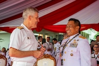 BALI, Indonesia (Feb. 16, 2025) - Adm. Steve Koehler, commander, U.S. Pacific Fleet, left, greets Indonesian Navy Rear Adm. Achmad Wibisono during the opening ceremony of Multilateral Naval Exercise Komodo (MNEK) 2025 in Bali, Indonesia, Feb. 16. Hosted by the Indonesian Navy, MNEK 2025 is an international, joint exercise taking place in the vicinity of Bali, Indonesia, emphasizing multilateral maritime cooperation and disaster response. (U.S. Navy photo by Mass Communication Specialist 1st Class Caroline H. Lui)
