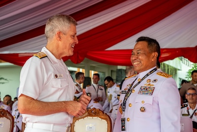 BALI, Indonesia (Feb. 16, 2025) - Adm. Steve Koehler, commander, U.S. Pacific Fleet, left, greets Indonesian Navy Rear Adm. Achmad Wibisono during the opening ceremony of Multilateral Naval Exercise Komodo (MNEK) 2025 in Bali, Indonesia, Feb. 16. Hosted by the Indonesian Navy, MNEK 2025 is an international, joint exercise taking place in the vicinity of Bali, Indonesia, emphasizing multilateral maritime cooperation and disaster response. (U.S. Navy photo by Mass Communication Specialist 1st Class Caroline H. Lui)