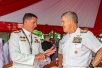 BALI, Indonesia (Feb. 16, 2025) - Adm. Steve Koehler, commander, U.S. Pacific Fleet, right, speaks with Vice Adm. Mark Hammond, Australia’s chief of navy, during the opening ceremony of Multilateral Naval Exercise Komodo (MNEK) 2025 in Bali, Indonesia, Feb. 16. Hosted by the Indonesian Navy, MNEK 2025 is an international, joint exercise taking place in the vicinity of Bali, Indonesia, emphasizing multilateral maritime cooperation and disaster response. (U.S. Navy photo by Mass Communication Specialist 1st Class Caroline H. Lui)