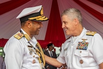 BALI, Indonesia (Feb. 16, 2025) - Adm. Steve Koehler, commander, U.S. Pacific Fleet, right, greets Bangladesh Navy Rear Adm. S. M. Abul Kalam Azad, commander, Dhaka Naval Area, during the opening ceremony of Multilateral Naval Exercise Komodo (MNEK) 2025 in Bali, Indonesia, Feb. 16. Hosted by the Indonesian Navy, MNEK 2025 is an international, joint exercise taking place in the vicinity of Bali, Indonesia, emphasizing multilateral maritime cooperation and disaster response. (U.S. Navy photo by Mass Communication Specialist 1st Class Caroline H. Lui)