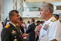 BALI, Indonesia (Feb. 16, 2025) - Adm. Steve Koehler, commander, U.S. Pacific Fleet, right, greets Indonesian Army Maj. Gen. Muhammad Zamroni, commander, Military Regional Command IX/Udayana, during Multilateral Naval Exercise Komodo (MNEK) 2025 in Bali, Indonesia, Feb. 16. Hosted by the Indonesian Navy, MNEK 2025 is an international, joint exercise taking place in the vicinity of Bali, Indonesia, emphasizing multilateral maritime cooperation and disaster response. (U.S. Navy photo by Mass Communication Specialist 1st Class Caroline H. Lui)