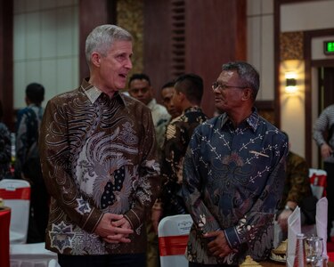 BALI, Indonesia (Feb. 16, 2025) - Adm. Steve Koehler, commander, U.S. Pacific Fleet, left, greets Commodore Higínio das Neves, commander, Naval Component of the Timor-Leste Defense Force, before joining him at a table for the Multilateral Naval Exercise Komodo (MNEK) 2025 welcome dinner in Bali, Indonesia, Feb. 16. Hosted by the Indonesian Navy, MNEK 2025 is an international, joint exercise taking place in the vicinity of Bali, Indonesia, emphasizing multilateral maritime cooperation and disaster response protocols. (U.S. Navy photo by Mass Communication Specialist 1st Class Caroline H. Lui)