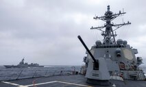 he Arleigh Burke-class guided-missile destroyer USS Dewey (DDG 105) sails alongside the Japan Maritime Self-Defense Force Asahi-class destroyer JS Asahi (DD-119) during bilateral operations in the Philippine Sea, Feb. 10, 2025.