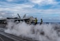 Sailors conduct flight operations on the flight deck of the Nimitz-class aircraft carrier USS Carl Vinson (CVN 70) in the Philippine Sea during Pacific Steller 2025, Feb. 14.
