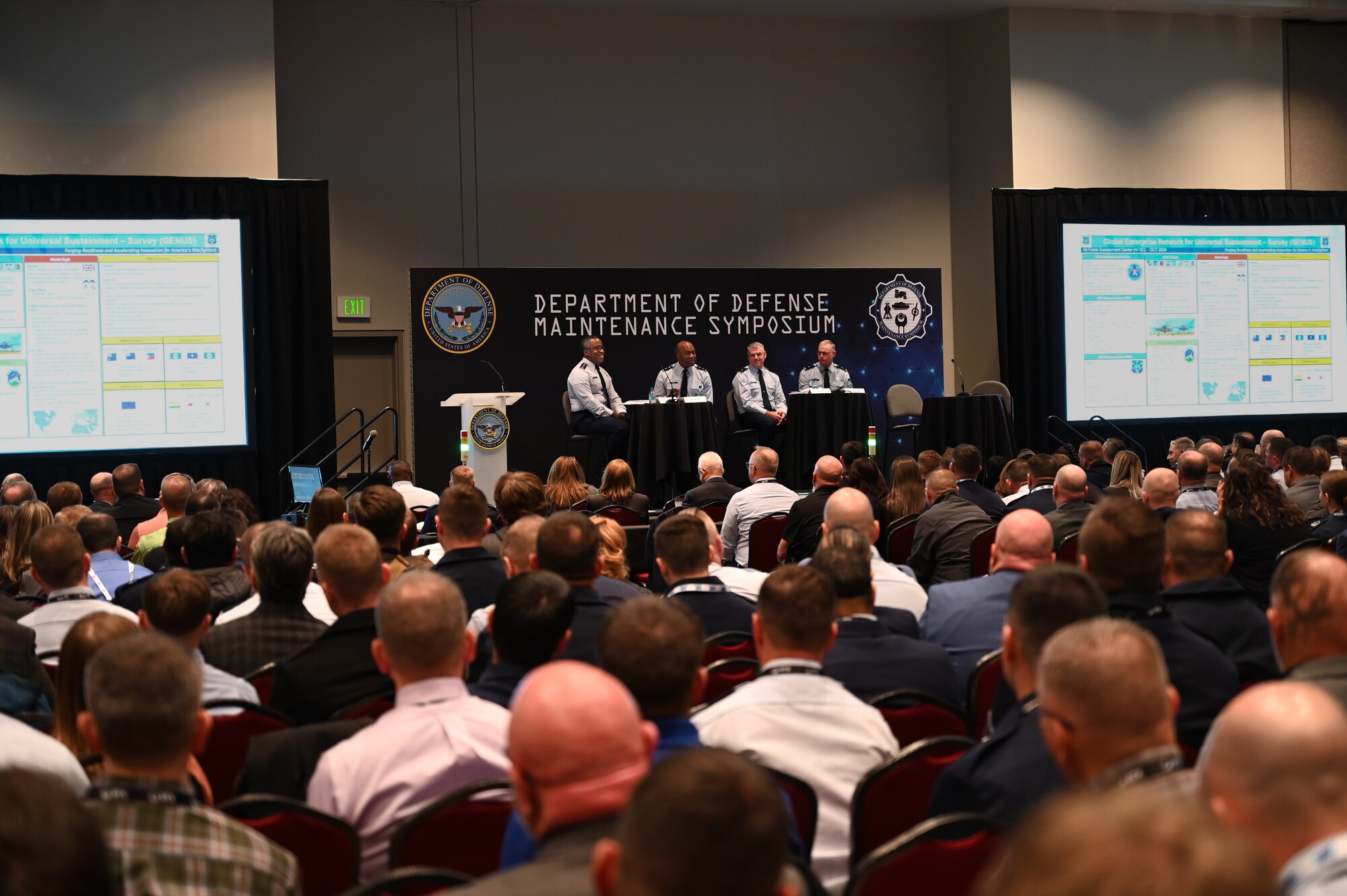 Military men hosting a town hall meeting