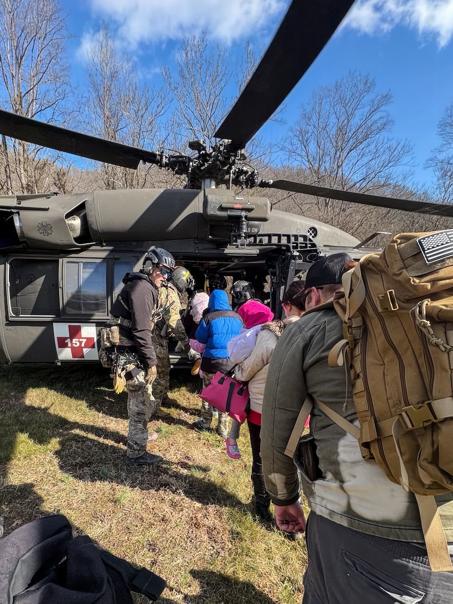 Airmen from the Kentucky Air National Guard’s 123rd Special Tactics Squadron evacuate 296 stranded residents from two housing complexes surrounded by floodwaters in Martin County, Kentucky, Feb. 17, 2025. The residents were flown to the Big Sandy Regional Airport in Debord aboard UH-60 Black Hawk helicopters from the Indiana Army National Guard and the Kentucky Army National Guard’s 63rd Theater Aviation Brigade.