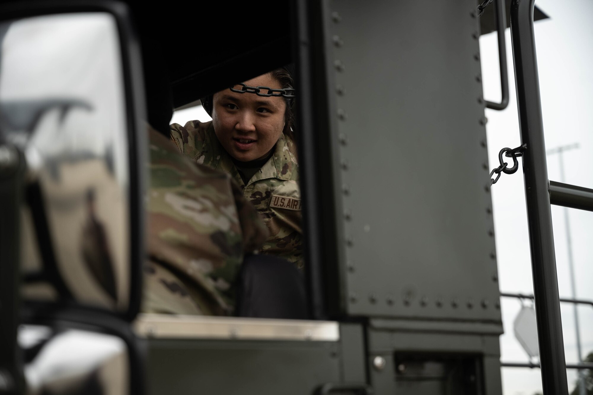 U.S. Airman speaks to member