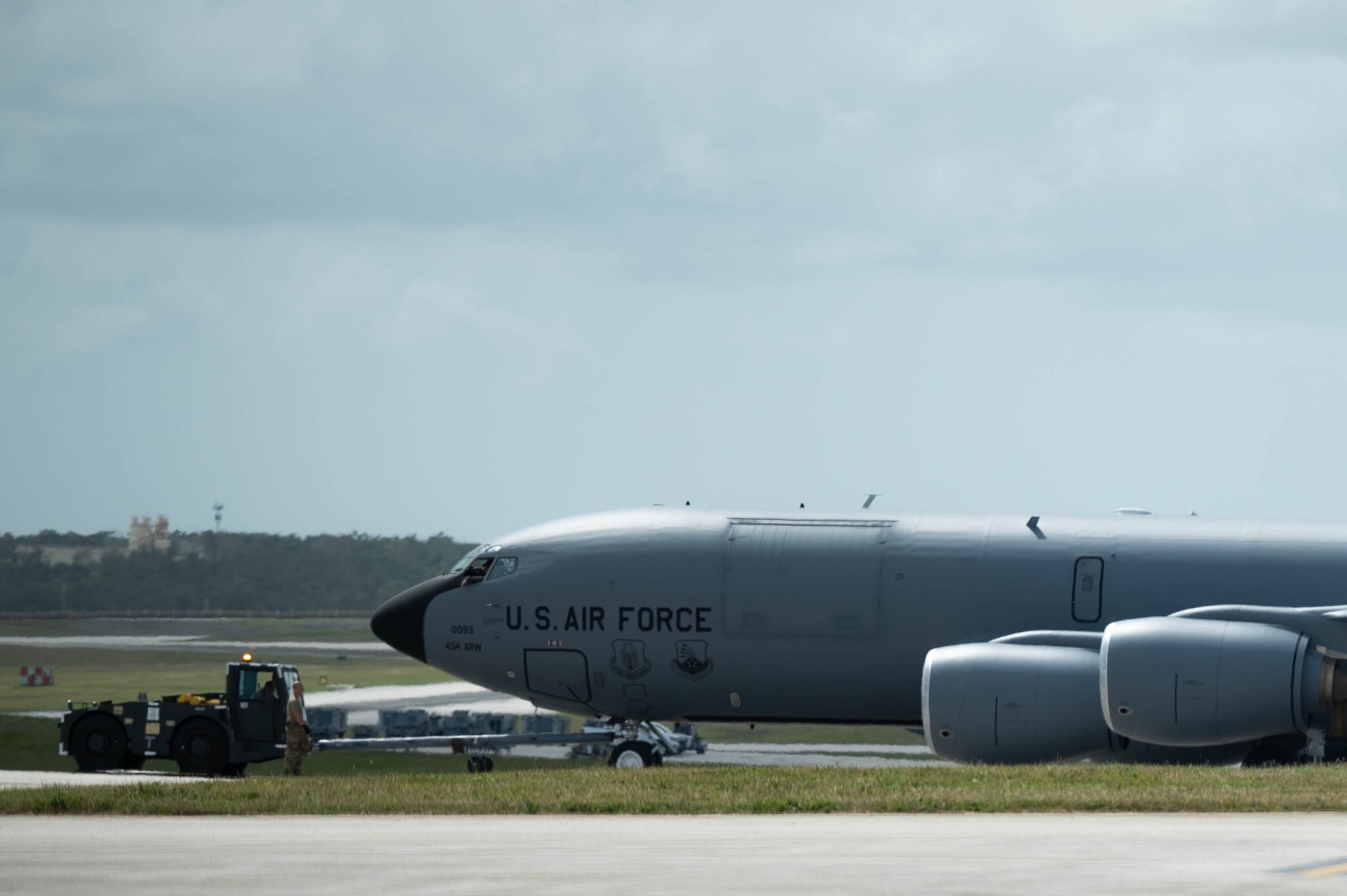 Side view of KC-135R Stratotanker being towed on the airfield