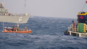 Coast Guard team from the fast-response cutter USCGC Clarence Sutphin, Jr. (WPC 1147) rescue seven mariners as their vessel slowly sinks in the Central Arabian Gulf, Feb. 18.