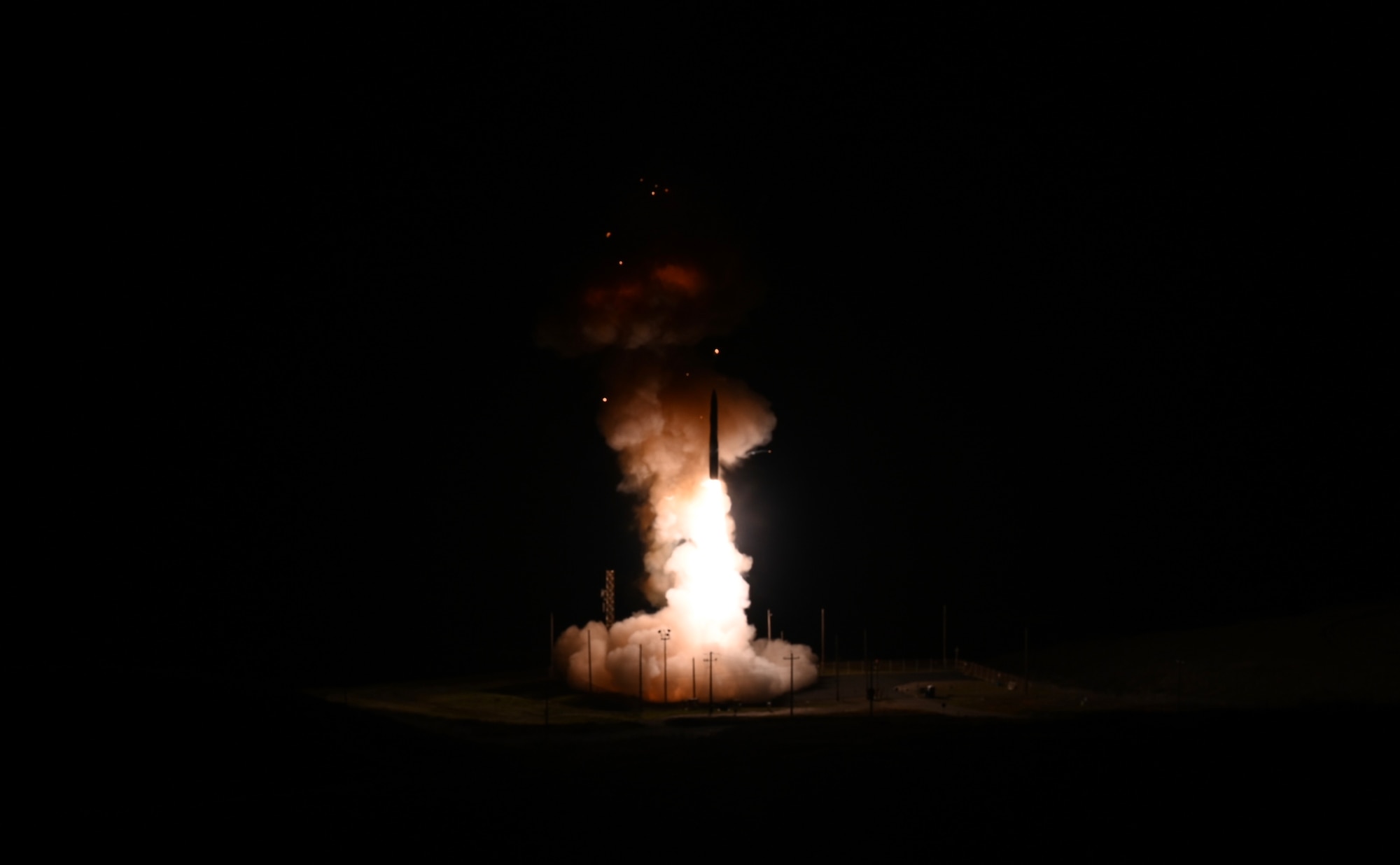 A missile is launched out of the ground.