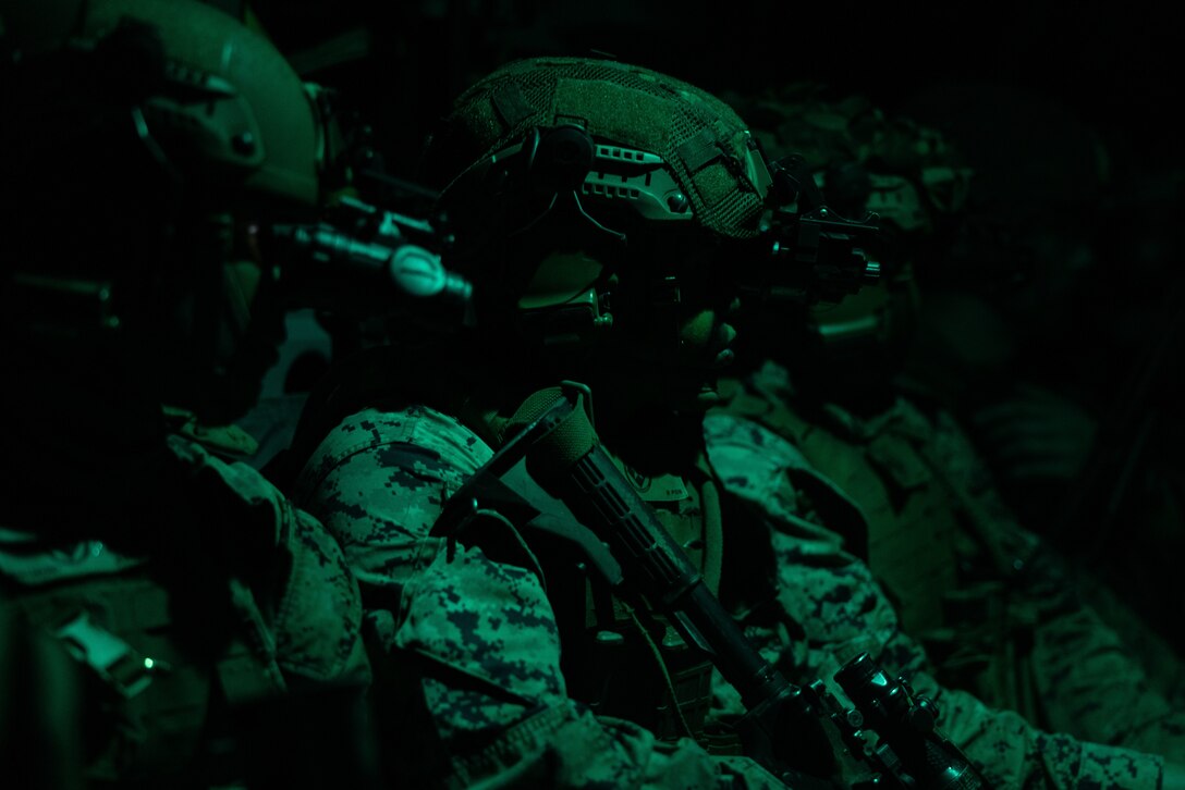 U.S. Marine Corps Lance Cpl. Jan MorenoViloatoro, a mortarman with Kilo Company, Battalion Landing Team, 3rd Battalion, 6th Marine Regiment, 22nd Marine Expeditionary Unit, rides aboard an MV-22B Osprey with Marine Medium Tiltrotor Squadron 263 (Reinforced) during a simulated raid as part of Marine Air-Ground Task Force (MAGTF) Interoperability exercise, at Stone Bay on Marine Corps Base Camp Lejeune North Carolina, Feb. 2, 2025. The raid is one of several training events within MAGTF Interoperability, a course conducted by Expeditionary Operations Training Group (EOTG). This course is designed to train and evaluate integrated elements of the 22nd MEU across a variety of full mission profiles in a simulated peer threat environment. (U.S. Marine Corps photo by Sgt. Nathan Mitchell)