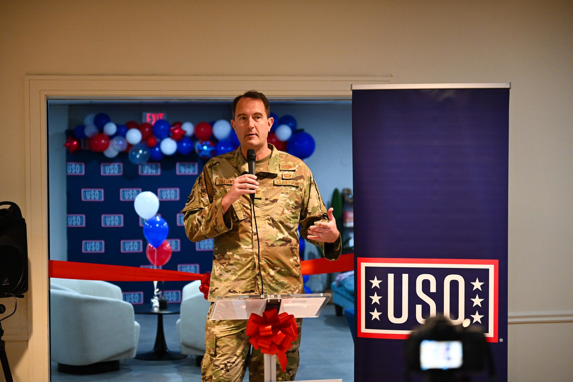 U.S. Air Force Col. Jesse Caldwell, 47th Flying Training Wing, deputy commander, speaks at United Service Organizations (USO) day room ribbon cutting ceremony at Laughlin Air Force Base, Feb. 4, 2025. This is the first time in Laughlin’s history to have a physical location on base, providing a dedicated space for the USO to deliver their mission at a regular tempo.
