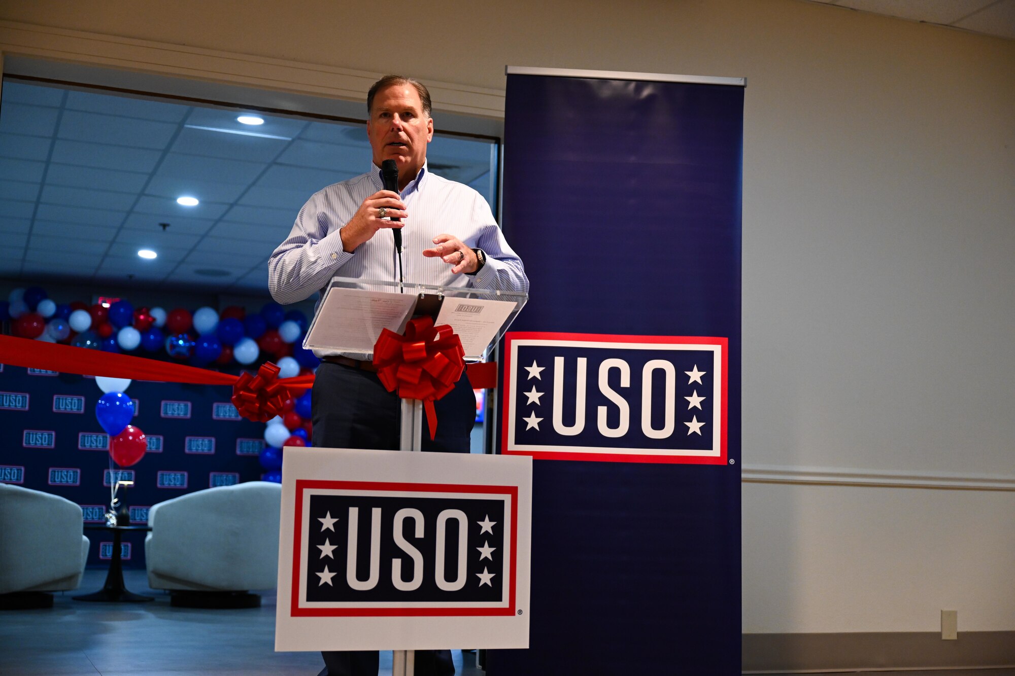 Gary Cole, USO West Region, president, speaks at United Service Organizations (USO) day room ribbon cutting ceremony at Laughlin Air Force Base, Feb. 4, 2025. This is the first time in Laughlin’s history to have a physical location on base, providing a dedicated space for the USO to deliver their mission at a regular tempo