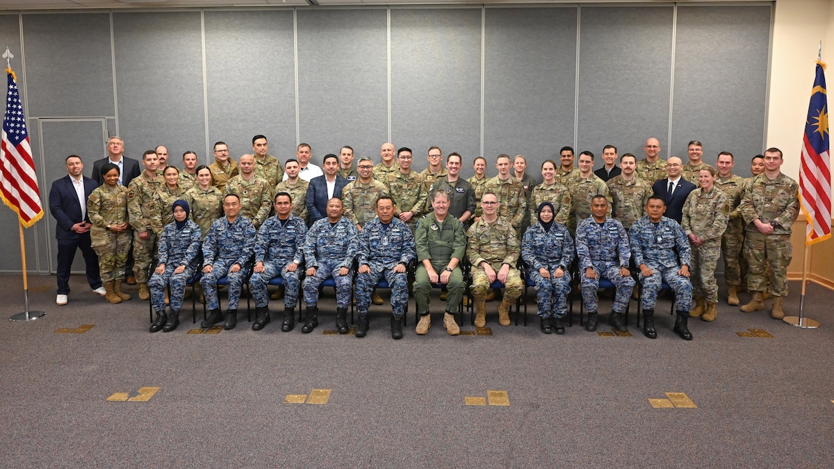 Participants of the Seventh Annual Airman-to-Airman Talks pose for a group photo at Camp Murray, Washington, February, 11, 2025. The three-day program focused on professional development, air domain awareness, and strengthening relationships between Pacific Air Forces, Washington Air National Guard, and Royal Malaysian Air Force. (U.S. Air National Guard Photo by Master Sergeant Brandy Burke)