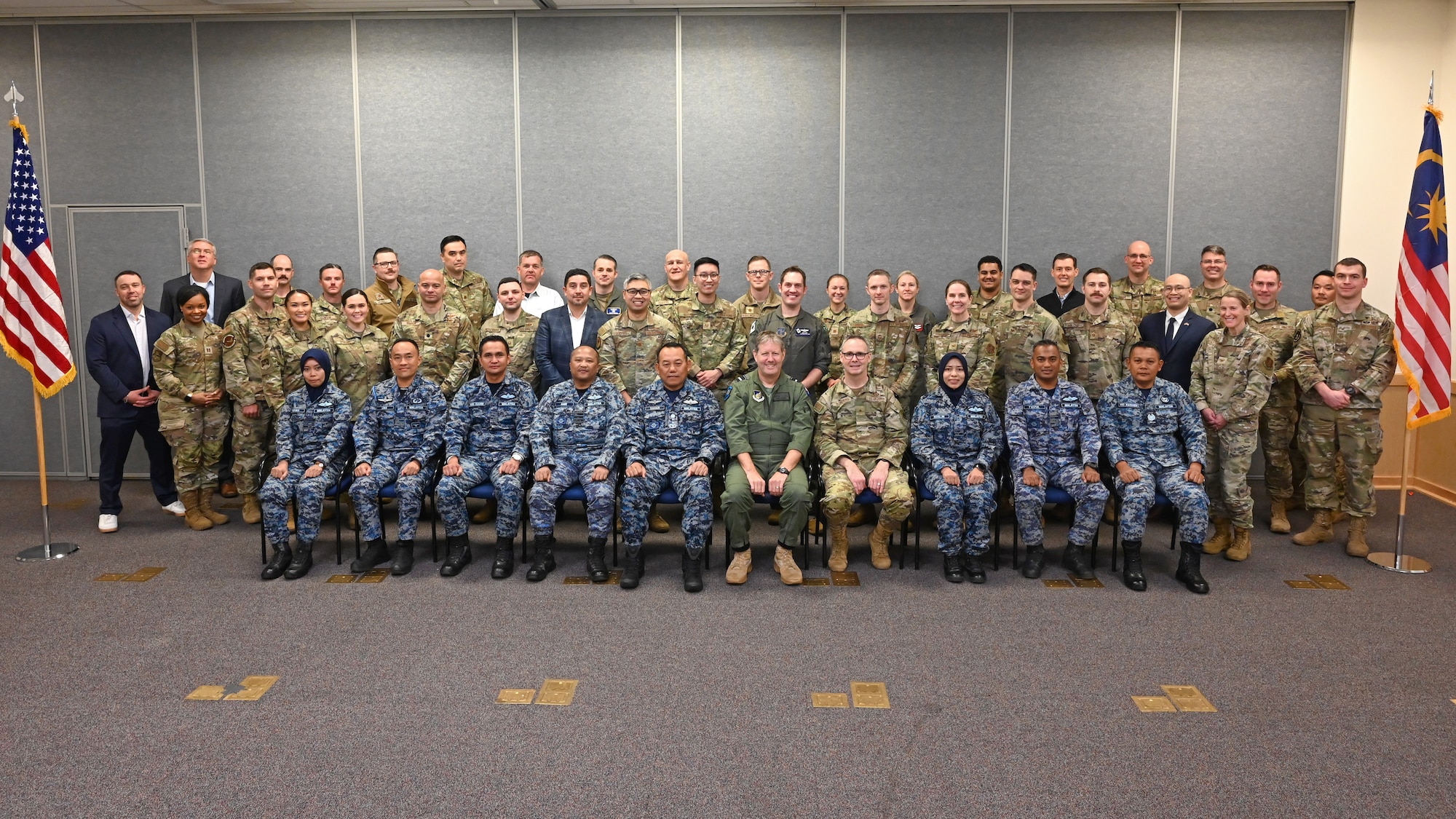 Participants of the Seventh Annual Airman-to-Airman Talks pose for a group photo at Camp Murray, Washington, February, 11, 2025. The three-day program focused on professional development, air domain awareness, and strengthening relationships between Pacific Air Forces, Washington Air National Guard, and Royal Malaysian Air Force. (U.S. Air National Guard Photo by Master Sergeant Brandy Burke)