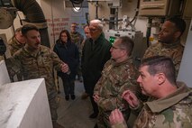 U.S. Air Force Gen. Jim Slife (right), Air Force vice chief of staff (VCSAF), and U.S. Air Force Lt. Gen. Andrew Gebara (bottom right), Air Force deputy chief of staff for strategic deterrence and nuclear integration, receive a briefing from Tech. Sgt. Stephen Delvacchio (left), 91st Missile Maintenance Squadron training instructor, during a base visit at a missile launch facility near Minot Air Force Base, North Dakota, Feb. 15, 2025. Delvacchio provided additional insight into how Airmen of the 91st Missile Wing execute the nation’s nuclear deterrence mission. (U.S. Air Force photo by Senior Airman Kyle Wilson)