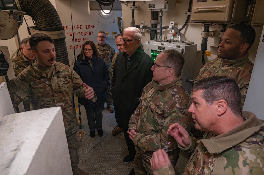 U.S. Air Force Gen. Jim Slife (right), Air Force vice chief of staff (VCSAF), and U.S. Air Force Lt. Gen. Andrew Gebara (bottom right), Air Force deputy chief of staff for strategic deterrence and nuclear integration, receive a briefing from Tech. Sgt. Stephen Delvacchio (left), 91st Missile Maintenance Squadron training instructor, during a base visit at a missile launch facility near Minot Air Force Base, North Dakota, Feb. 15, 2025. Delvacchio provided additional insight into how Airmen of the 91st Missile Wing execute the nation’s nuclear deterrence mission. (U.S. Air Force photo by Senior Airman Kyle Wilson)