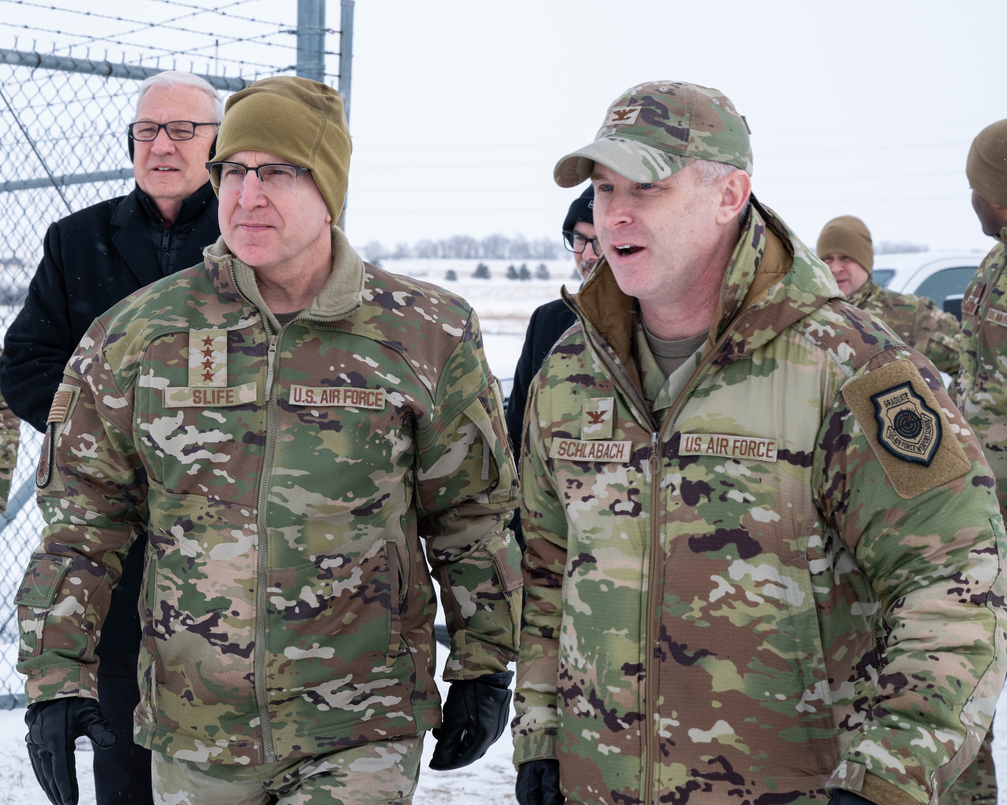 U.S. Air Force Gen. Jim Slife (left), Air Force vice chief of staff (VCSAF), and U.S. Air Force Col. Jimmy Schlabach (right), 91st Missile Wing commander, arrive at a missile launch facility during a base visit near Minot Air Force Base, North Dakota, Feb. 15, 2025. As the VCSAF, Slife assists the Air Force chief of staff with organizing, training, and equipping 689,000 active-duty, Guard, Reserve, and civilian forces serving in the United States and overseas. (U.S. Air Force photo by Senior Airman Kyle Wilson)