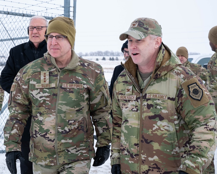 U.S. Air Force Gen. Jim Slife (left), Air Force vice chief of staff (VCSAF), and U.S. Air Force Col. Jimmy Schlabach (right), 91st Missile Wing commander, arrive at a missile launch facility during a base visit near Minot Air Force Base, North Dakota, Feb. 15, 2025. As the VCSAF, Slife assists the Air Force chief of staff with organizing, training, and equipping 689,000 active-duty, Guard, Reserve, and civilian forces serving in the United States and overseas. (U.S. Air Force photo by Senior Airman Kyle Wilson)
