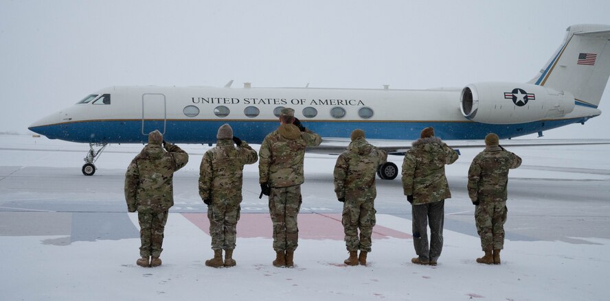 Team Minot leadership salute the plane carrying U.S. Air Force Gen. Jim Slife, Air Force vice chief of staff VCSAF), in preparation for a base and operations tour at Minot Air Force Base, North Dakota, Feb. 15, 2025. Slife visited Minot AFB to discuss facilities sustainment, restoration and
modernization. (U.S. Air Force photo by Airman 1st Class Wesley Davies)