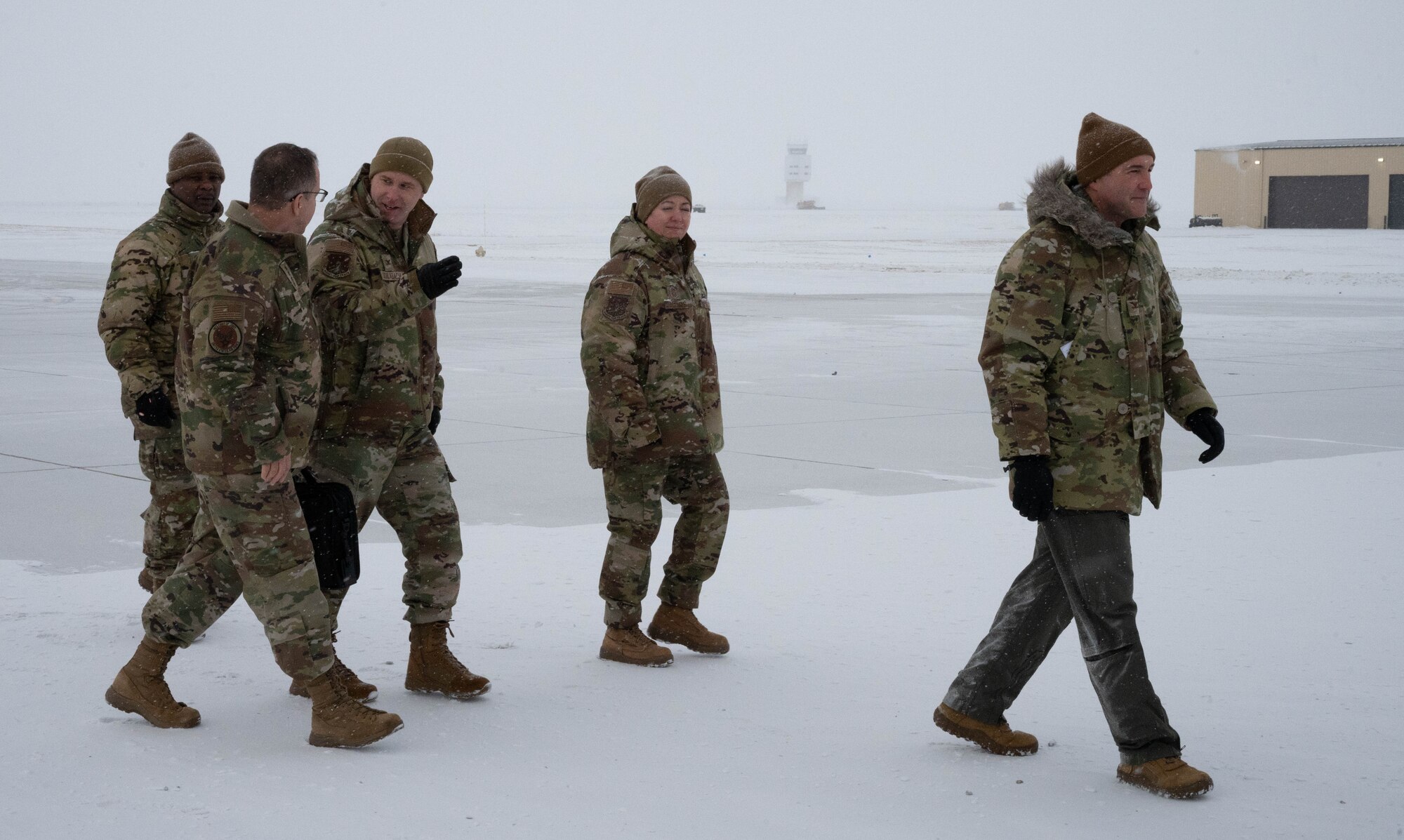 Team Minot leadership walk with U.S. Air Force Gen. Jim Slife, Air Force vice chief of staff (VCSAF), during a base
visit at Minot Air Force Base, North Dakota, Feb. 15, 2025. Slife visited Minot AFB to discuss improvements to
the base including the missile alert facilities, renovation of all 150 existing launch facilities in North Dakota, launch centers, utility corridors and communications towers. (U.S. Air Force photo by Airman 1st Class Wesley Davies)
