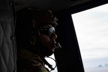 Senior Airman Daquane Williams, 91st Missile Security Operations Squadron (91MSOS) convoy response force fire observer, sits in a UH-1N Iroquois assigned to the 54th Helicopter Squadron at Minot Air Force Base, North Dakota, Feb. 7, 2025. Part of the 91st Security Forces Group at Minot Air Force Base, the 91MSOS protects Team Minot’s Minuteman III missiles and launch facilities.  (U.S. Air Force photo by Senior Airman Alyssa Bankston)