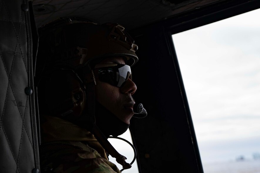 Senior Airman Daquane Williams, 91st Missile Security Operations Squadron (91MSOS) convoy response force fire observer, sits in a UH-1N Iroquois assigned to the 54th Helicopter Squadron at Minot Air Force Base, North Dakota, Feb. 7, 2025. Part of the 91st Security Forces Group at Minot Air Force Base, the 91MSOS protects Team Minot’s Minuteman III missiles and launch facilities.  (U.S. Air Force photo by Senior Airman Alyssa Bankston)