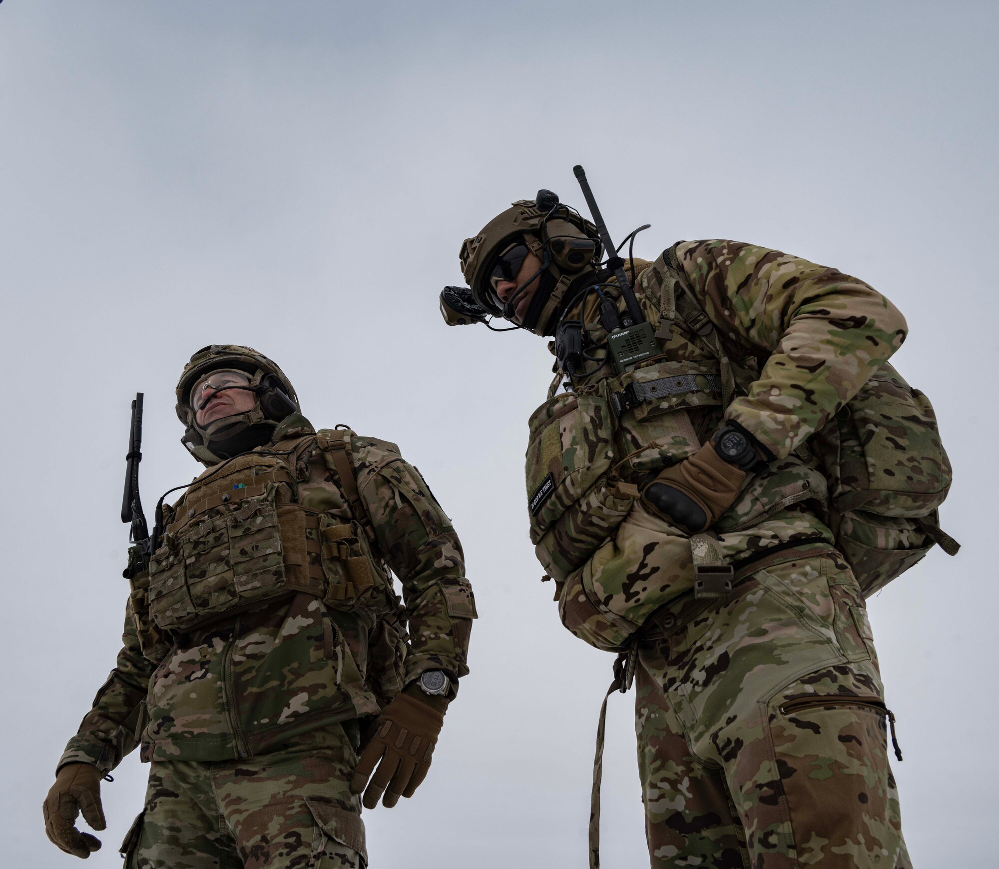 Chief Master Sgt. Matthew Tinck, 91st Operations Group senior enlisted leader (left), and Senior Airman Daquane Williams, 91st Missile Security Operations Squadron convoy response force fire observer (right), provide close air support (CAS) for training at Minot Air Force Base, North Dakota, Feb. 7, 2025. CAS is a military tactic in which enemy targets close to friendly forces are attacked by aircraft. (U.S. Air Force photo by Senior Airman Alyssa Bankston)