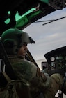 U.S. Air Force Capt. Damon Lappe, 54th Helicopter Squadron (54HS) UH-1N Iroquois pilot, prepares for lift off at Minot Air Force Base, North Dakota, Feb. 7, 2025. An important mission of the 54HS is to provide integrated rapid security response capabilities to Team Minot. (U.S. Air Force photo by Senior Airman Alyssa Bankston)
