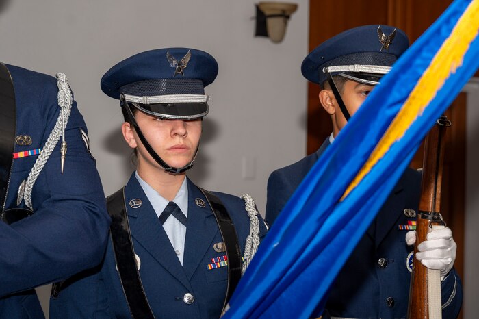 Senior Airman Paige Weldon, 355th Wing Public Affairs specialist and base honor guardsman, presents the colors during an awards ceremony at Davis-Monthan Air Force Base, Arizona, May 1, 2024. Weldon served as a base honor guardsman from November 2023 to April 2024. (U.S. Air Force photo by Airman 1st Class Jhade Herrera)