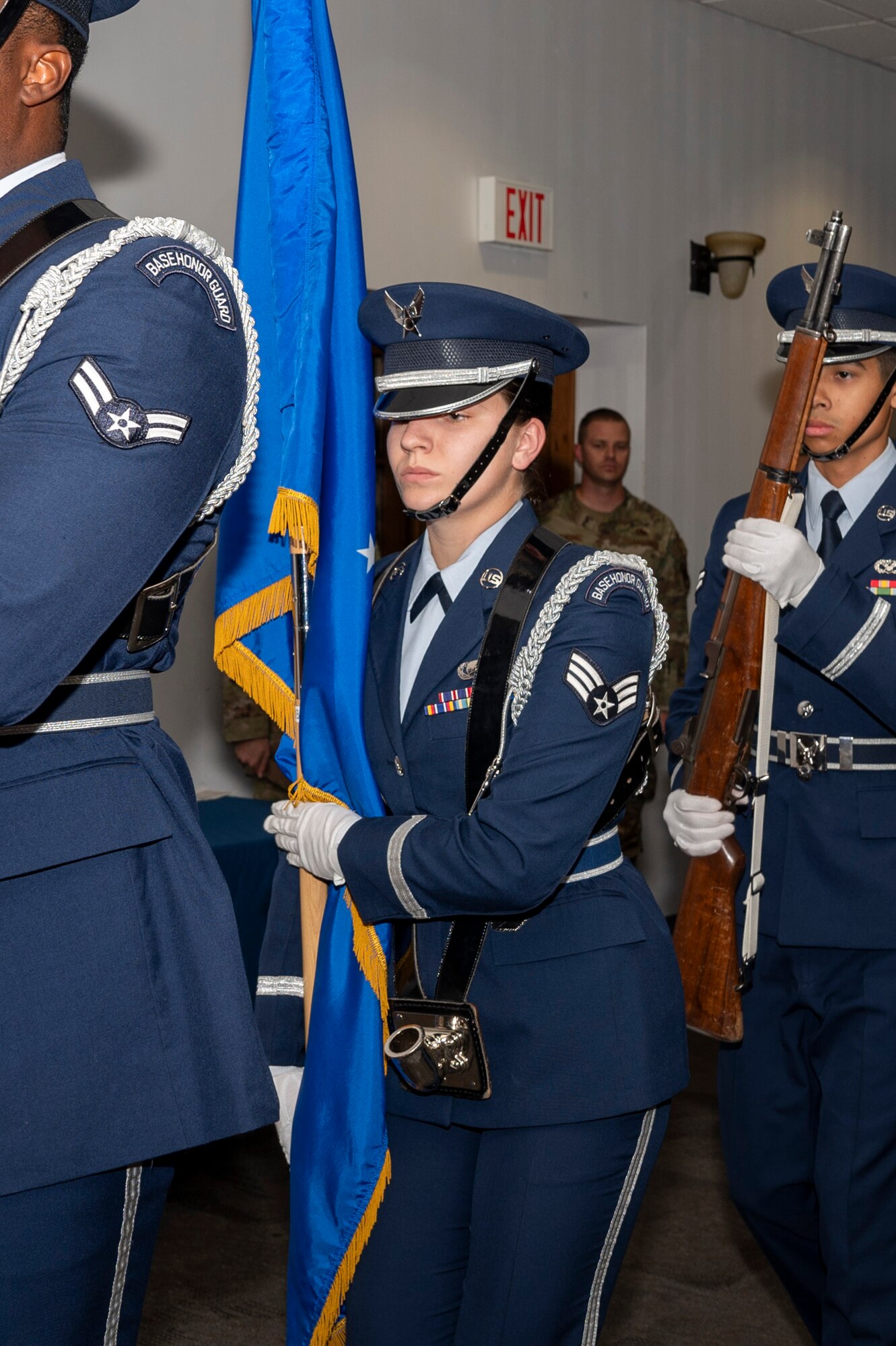 Senior Airman Paige Weldon, 355th Wing Public Affairs specialist and a member of the base honor guardsman, holds the Air Force flag during the presentation of colors at an awards ceremony at Davis-Monthan Air Force Base, Arizona, May 1, 2024. Weldon won the Guardsman of the Quarter award at the ceremony, subsequently nominating her for the bases’ Guardsman of the Year award. (U.S. Air Force photo by Airman 1st Class Jhade Herrera)