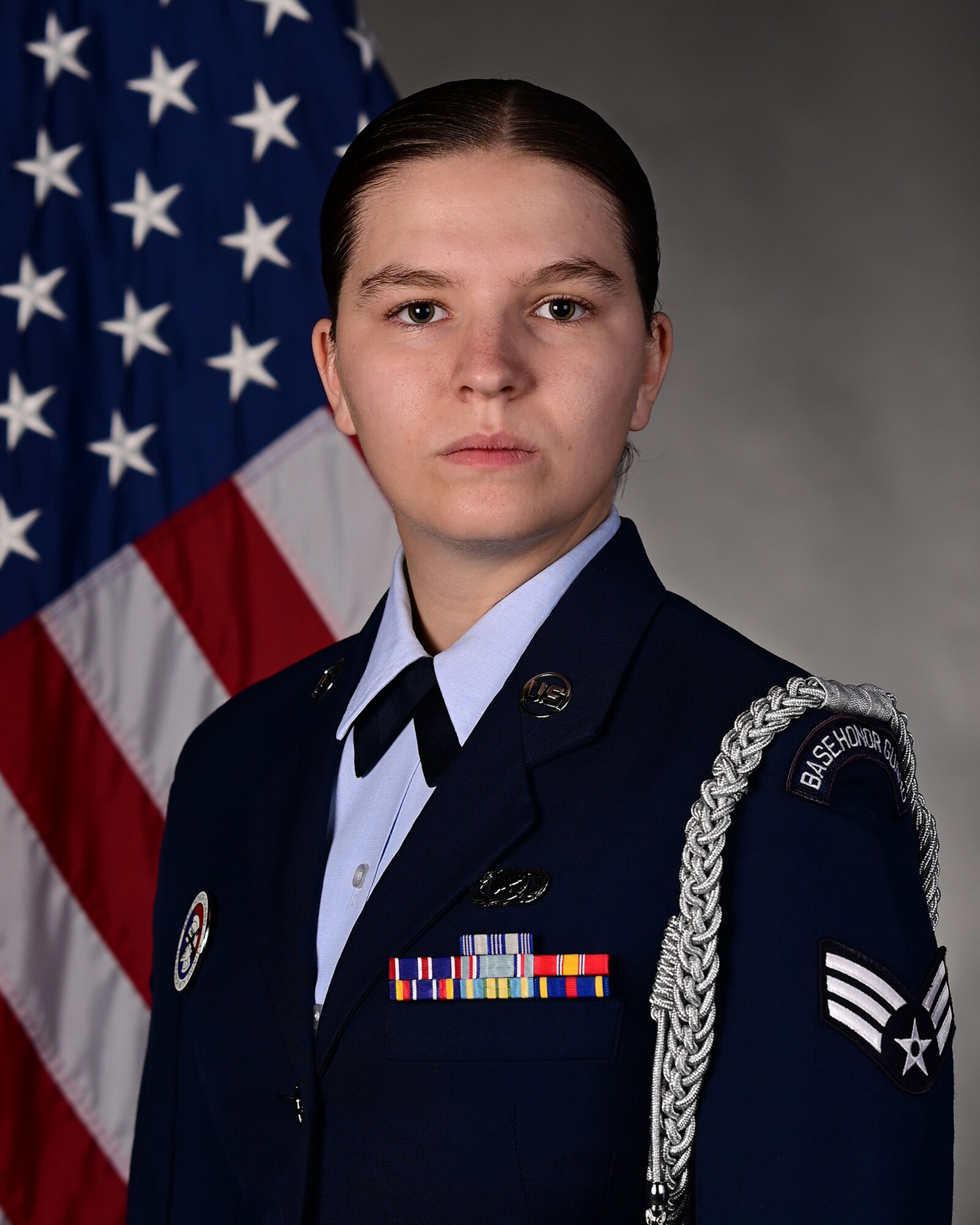 Senior Airman Paige Weldon, 355th Wing Public Affairs specialist and former base honor guardsman, poses for her official photo at Davis-Monthan Air Force Base, Arizona, Sept. 16, 2024. Weldon was required to wear a ceremonial guardsman blouse for the photo to submit for the bases’ Guardsman of the Year award. (U.S. Air Force photo by Airman 1st Class Jasmyne Bridgers-Matos)