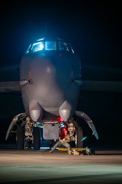 Ground crew members conduct post-flight checks on a U.S. Air Force B-52H Stratofortress aircraft at RAF Fairford, England, after completing a Bomber Task Force 25-2 deployment mission, Feb. 18, 2025. Bomber Task Force operations enhance the ability to conduct dynamic force employment. (U.S. Air Force photo by Staff Sgt. Kristen Heller)