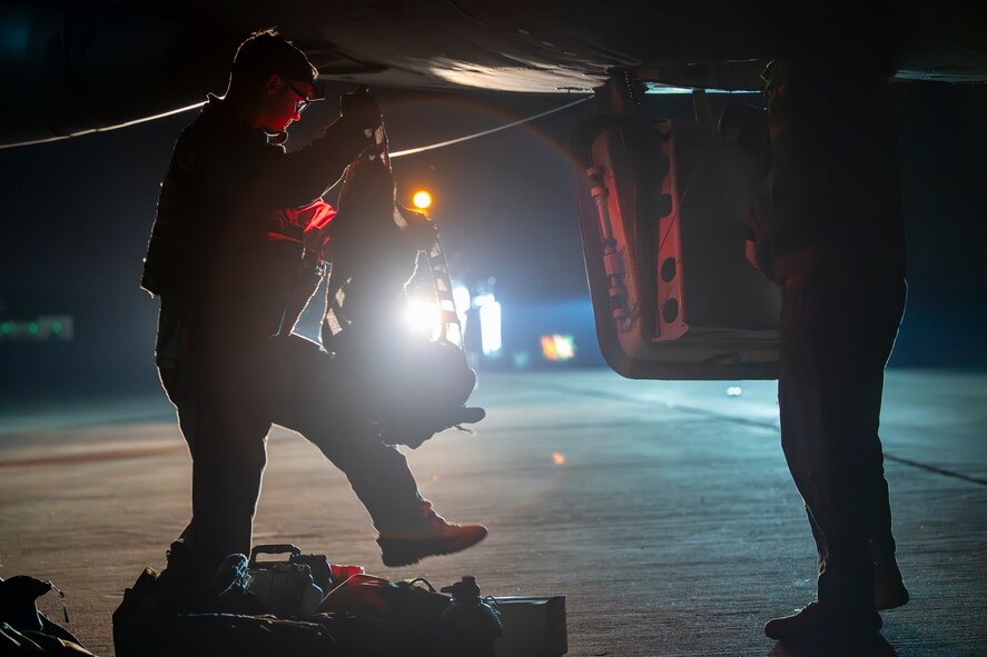 A U.S. Air Force aircrew member removes flight gear after returning from a sortie in support of the Bomber Task Force 25-2 deployment at RAF Fairford, England, Feb. 18, 2025. BTF missions enable interoperability with allied and partner nations. (U.S. Air Force photo by Staff Sgt. Kristen Heller)