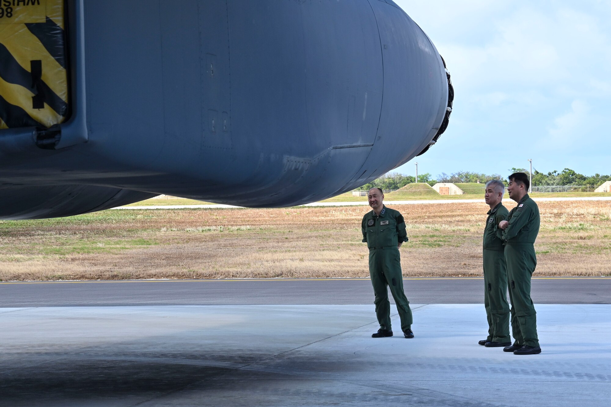 Members of the Japanese Air Defense Command view a B-1B Lancer assigned to the 34th Expeditionary Bomb Squadron, Ellsworth Air Force Base, S.D., during a Cope North 2025 distinguished visitors tour at Andersen Air Force Base, Guam, Feb. 12, 2025.