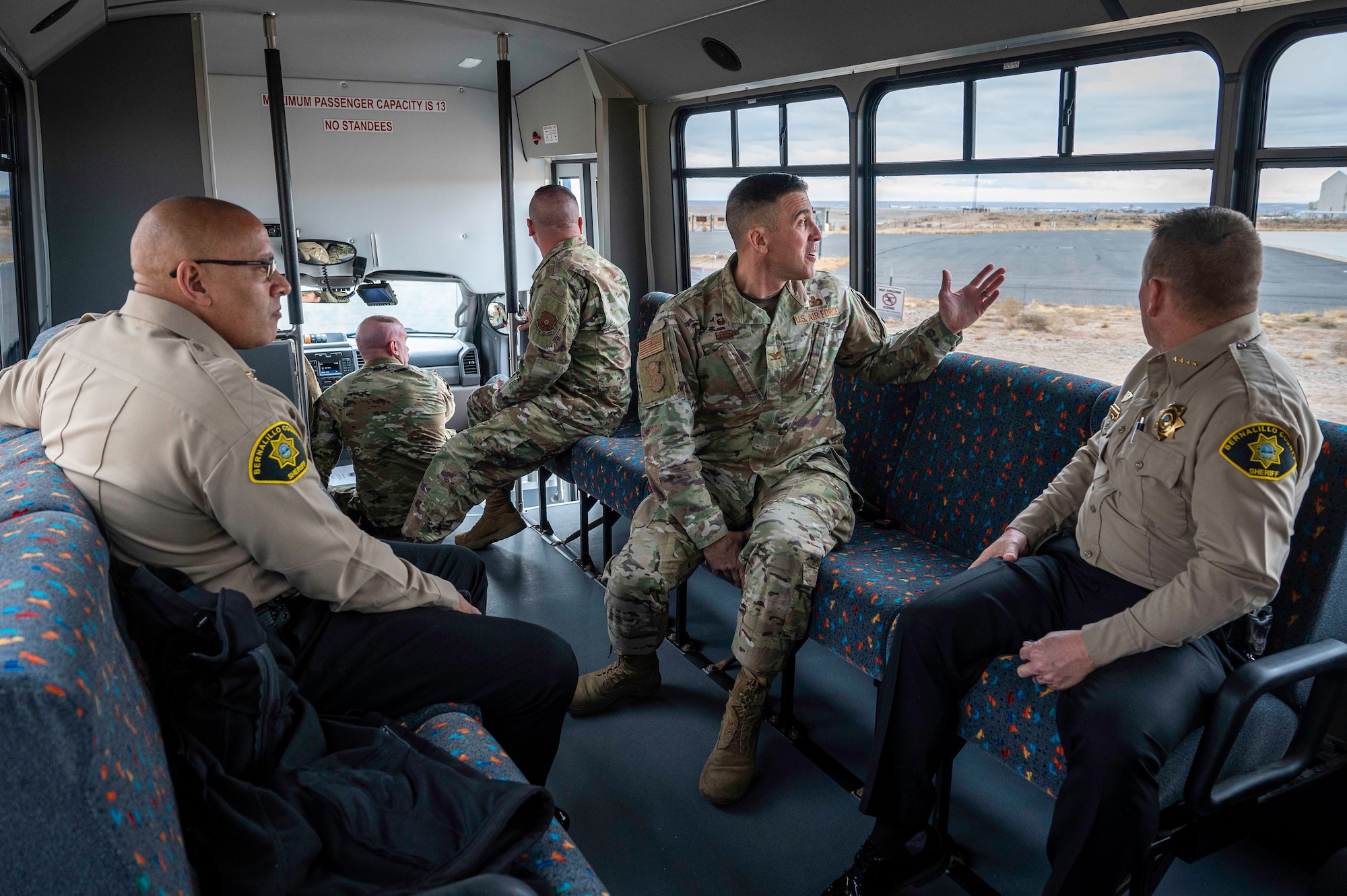 Col. Matthew Foisy, 377th Security Forces Group commander, explains the terrain challenges unique to Kirtland Air Force Base to the Bernalillo County Sheriff's Office leadership during an immersion tour at Kirtland Air Force Base, N.M., Feb. 18.