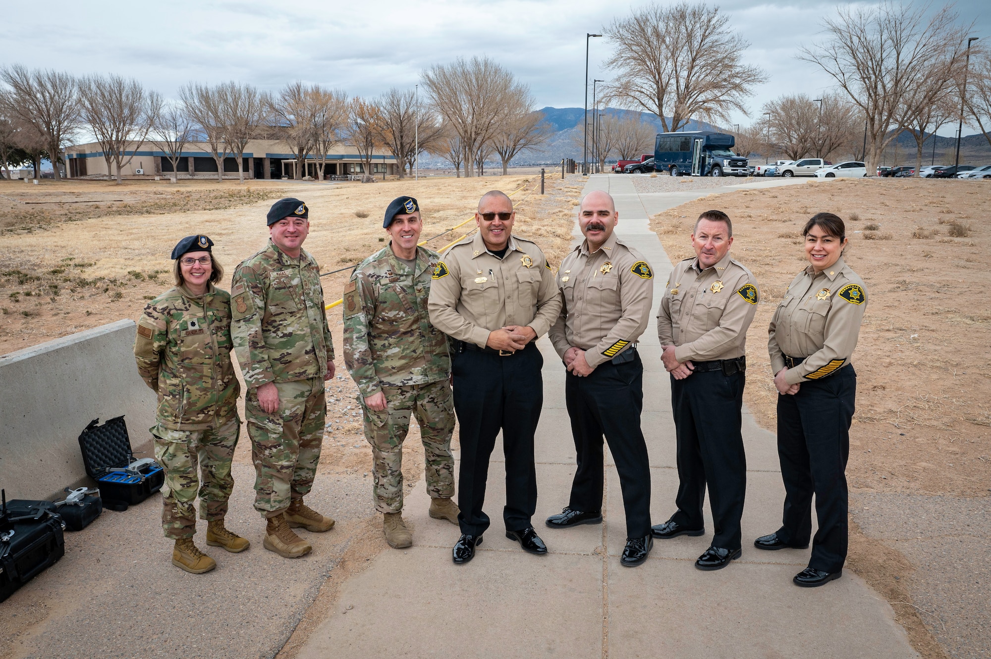 Leadership from the 377th Security Forces Group and Bernalillo County Sheriff’s Office pose for a group photo during an immersion tour at Kirtland Air Force Base.